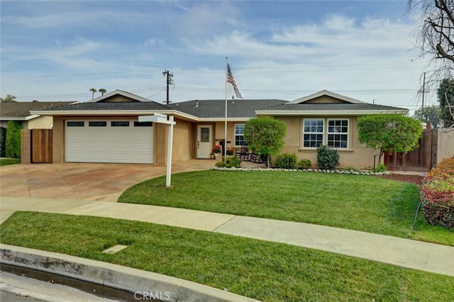 ranch-style home with a garage and a front yard