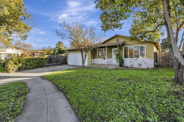 view of front of property featuring a front lawn and a garage