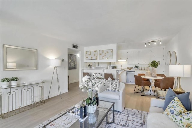 living room featuring light wood-type flooring