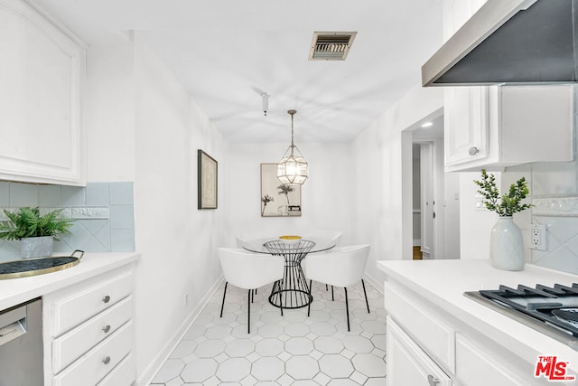 dining space with sink