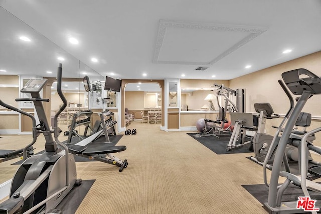 gym with light colored carpet