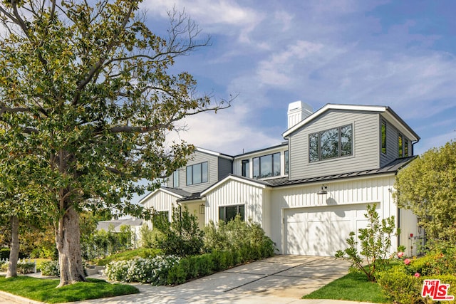 view of front of home with a garage