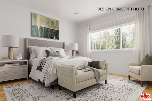 bedroom with hardwood / wood-style floors