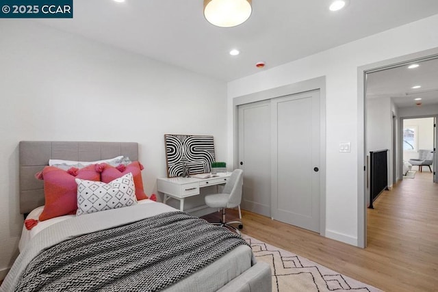 bedroom with light wood-type flooring