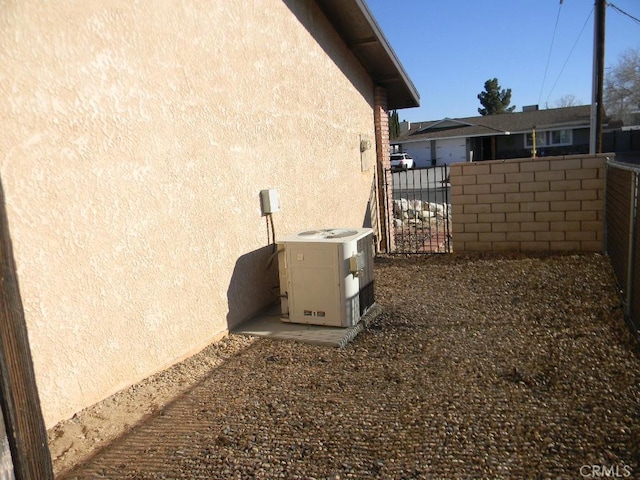 view of home's exterior featuring central AC unit