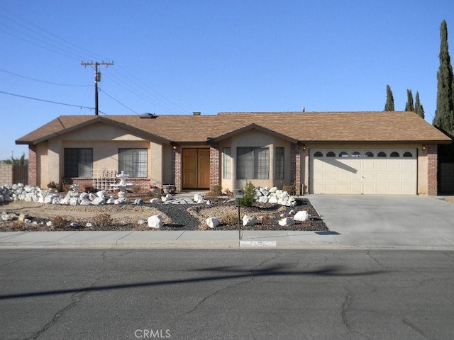 ranch-style house featuring a garage