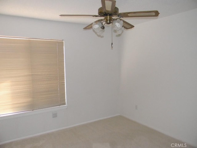 unfurnished room featuring carpet flooring and ceiling fan