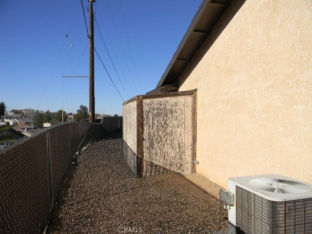 view of property exterior featuring central air condition unit