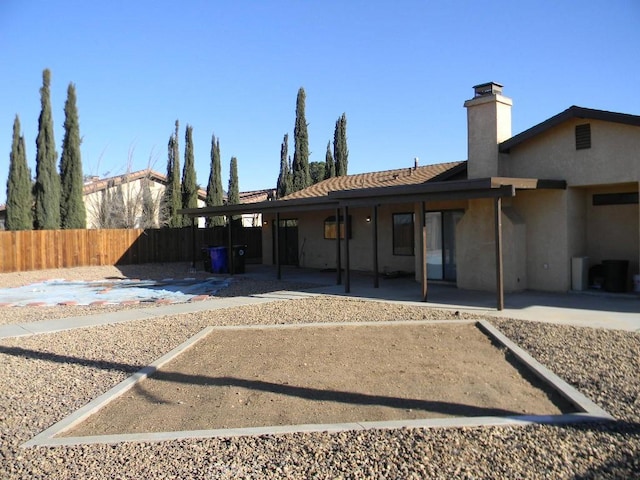 rear view of house with a patio area