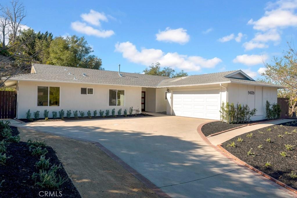 ranch-style house with a garage