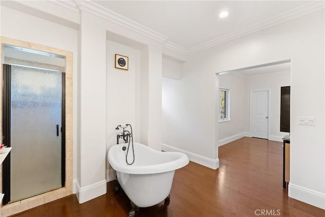 bathroom with crown molding, vanity, independent shower and bath, and hardwood / wood-style flooring