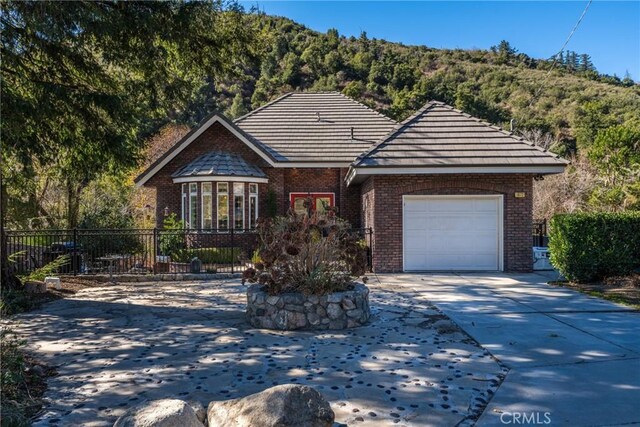 view of front of house with a garage