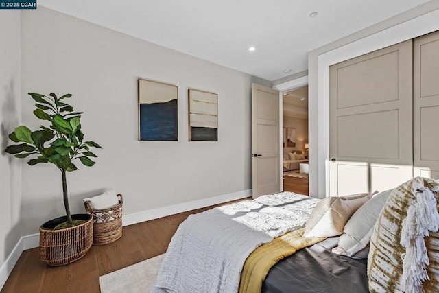 bedroom featuring dark hardwood / wood-style floors