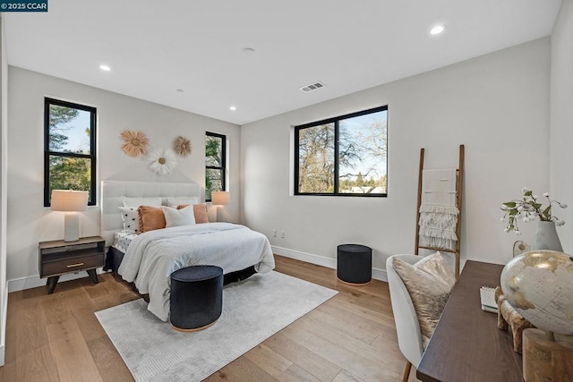 bedroom with light hardwood / wood-style flooring