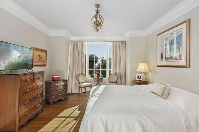 bedroom with dark hardwood / wood-style flooring and ornamental molding