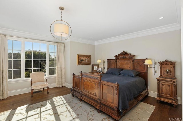 bedroom featuring ornamental molding and dark wood-type flooring