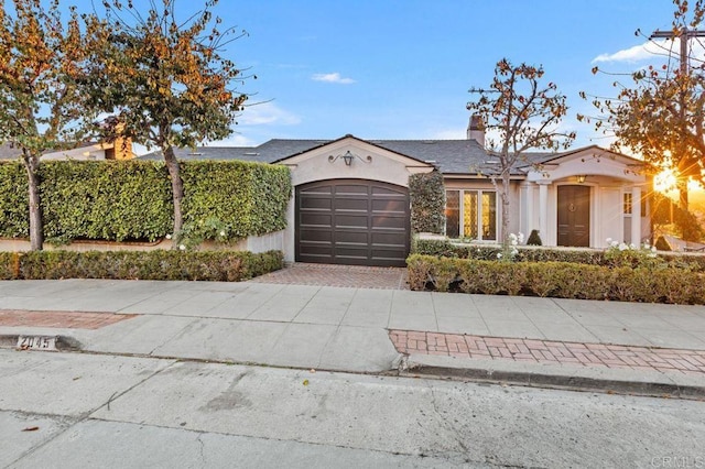 view of front of home with a garage