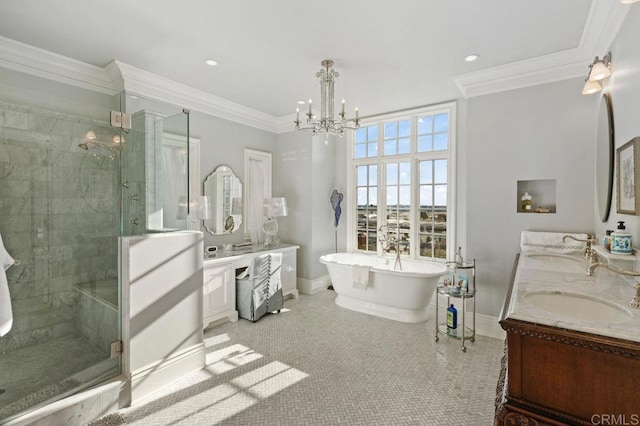 bathroom featuring shower with separate bathtub, a notable chandelier, crown molding, and vanity