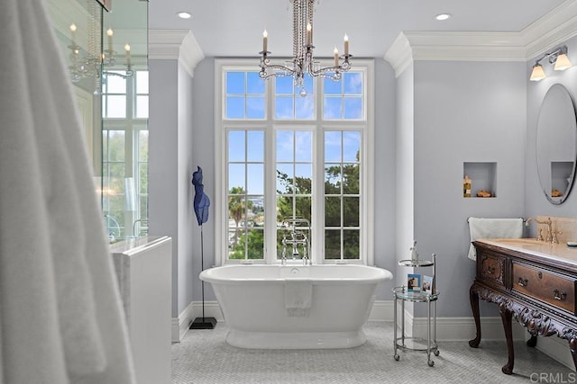 2045 W California St, San Diego, CA 92110 - full bathroom featuring a chandelier, ornamental molding, baseboards, a freestanding tub, and healthy amount of natural light