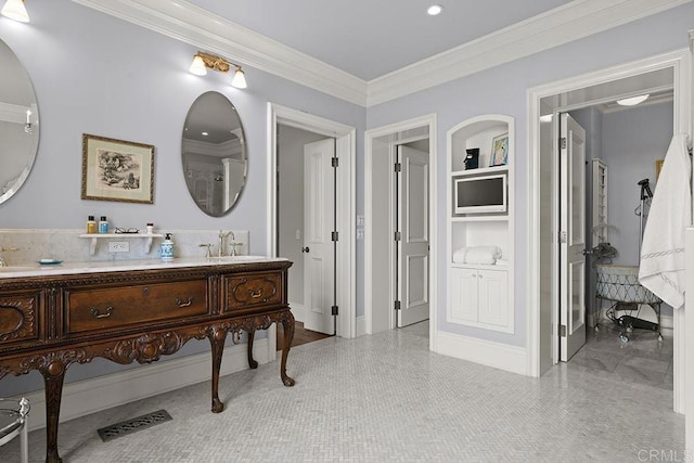 2045 W California St, San Diego, CA 92110 - bathroom featuring built in shelves, crown molding, and double vanity