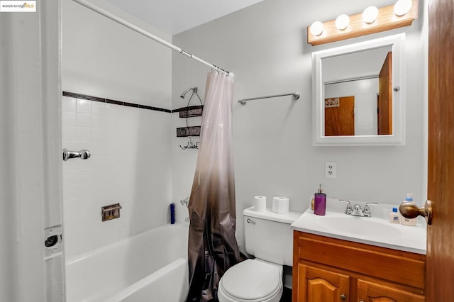 full bathroom with toilet, shower / tub combo, and vanity