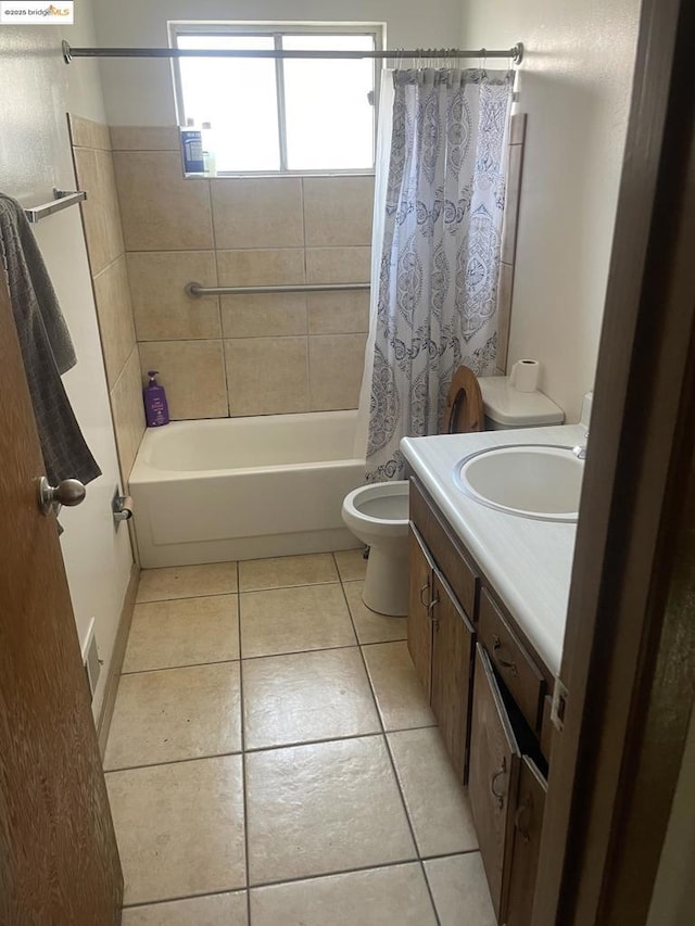 full bathroom with toilet, tile patterned flooring, shower / bath combo with shower curtain, and vanity