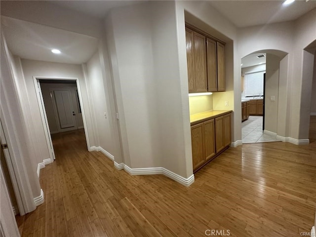 hall featuring light hardwood / wood-style flooring