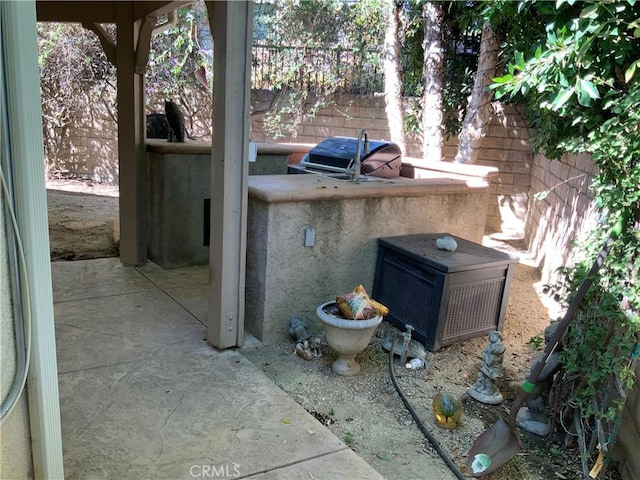 view of patio with area for grilling