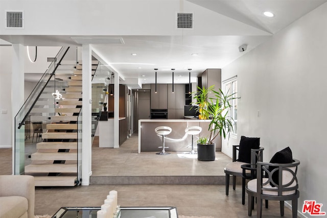 living room featuring vaulted ceiling