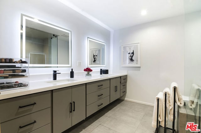 bathroom with vanity and tile patterned floors