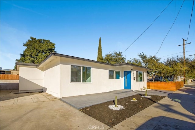 ranch-style home with a patio