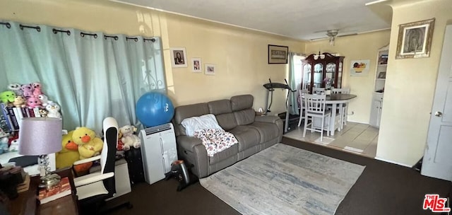 living room featuring ceiling fan