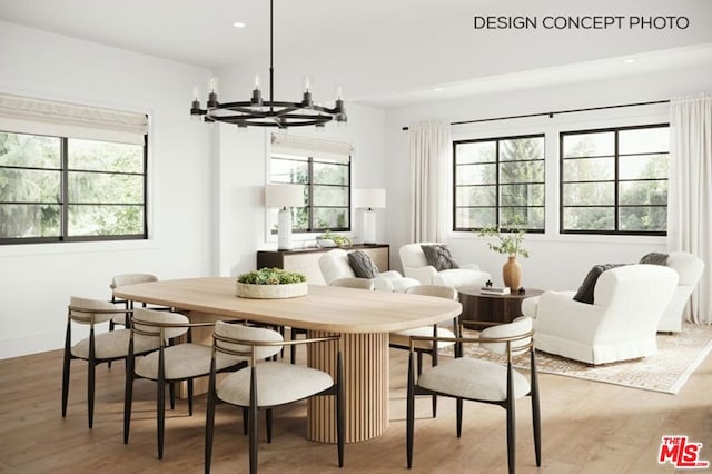 dining room with a chandelier and hardwood / wood-style flooring