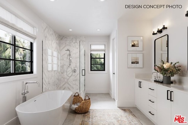 bathroom featuring vanity, independent shower and bath, and plenty of natural light