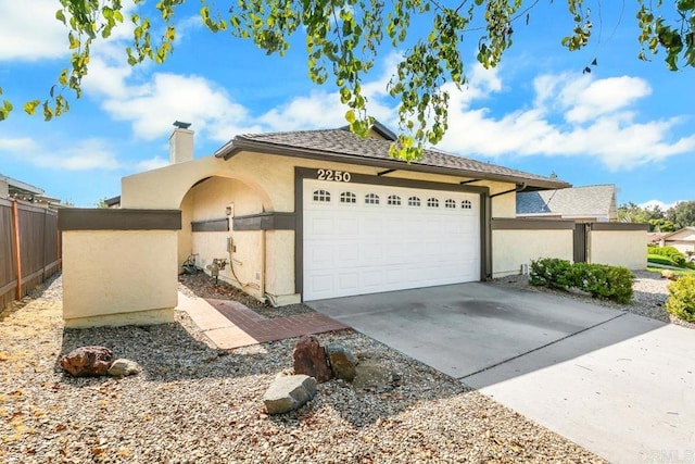 view of front of home featuring a garage