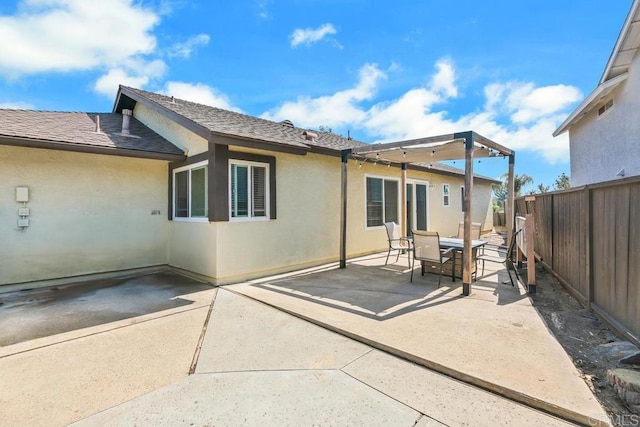 back of property featuring a patio area