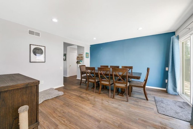 dining area featuring hardwood / wood-style floors