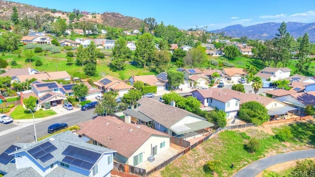 drone / aerial view featuring a mountain view