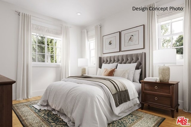 bedroom with light hardwood / wood-style floors