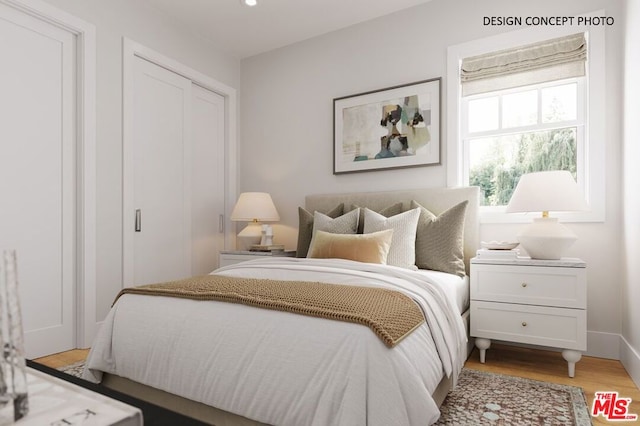 bedroom featuring a closet and light hardwood / wood-style flooring