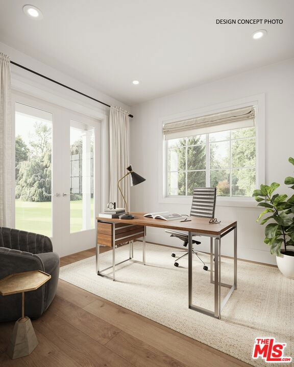 home office featuring hardwood / wood-style flooring and french doors