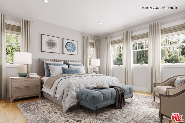 bedroom with light wood-type flooring