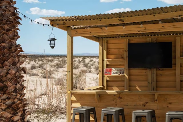 view of patio / terrace featuring a bar