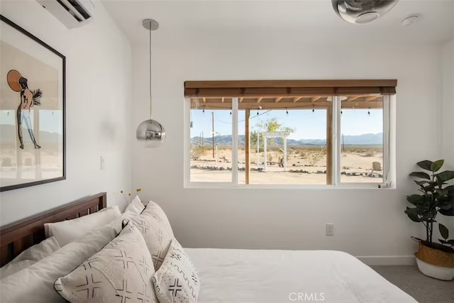 bedroom with a wall unit AC