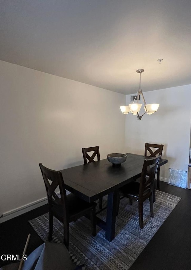 dining room featuring a chandelier