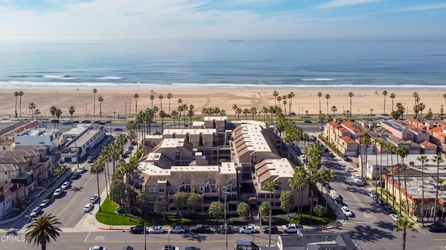 aerial view with a beach view and a water view