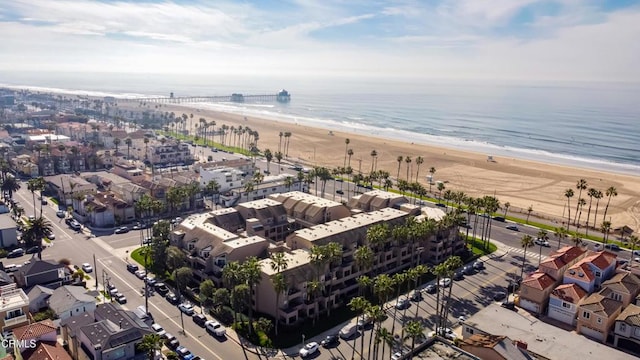 aerial view with a view of the beach and a water view