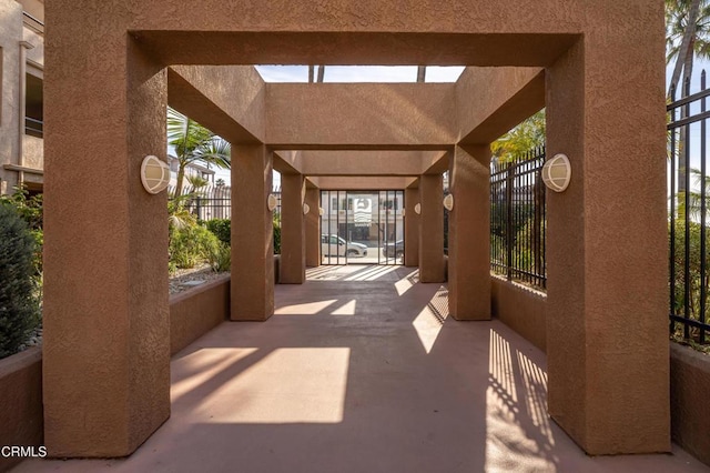 1200 Pacific Coast Hwy Unit 108, Huntington Beach, CA 92648 - view of patio / terrace featuring fence
