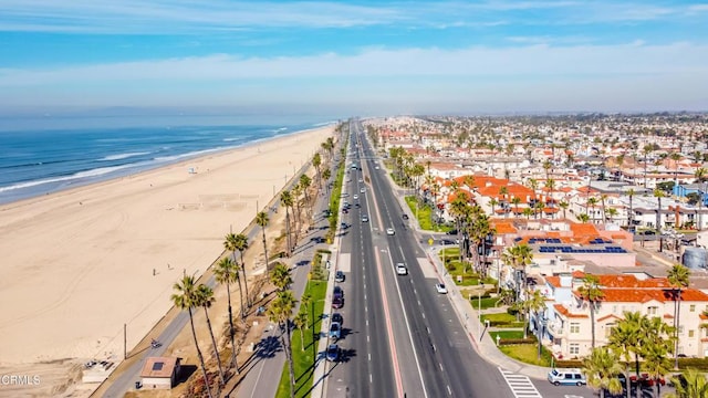 1200 Pacific Coast Hwy Unit 108, Huntington Beach, CA 92648 - birds eye view of property with a water view and a view of the beach