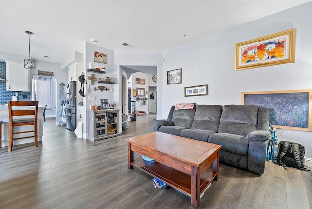 living room featuring dark hardwood / wood-style floors